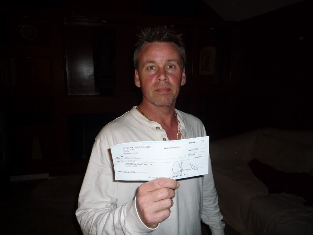 Robert with first Check for thousands from RE investing the right way